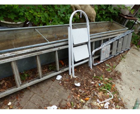 AN ALLUMINIMUM EXPENDING LADDER TOGETHER WITH TWO STEP LADDERS (3)