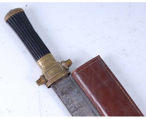 An 18th century French hunting sword, the 56cm double edged fullered blade etched to both sides with hunting scene, further e