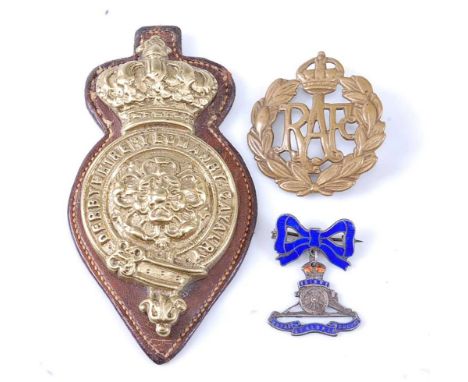 A Derbyshire Yeomanry Cavalry pouch plate, the central rose within garter and crown above, having five lugs to the reverse mo