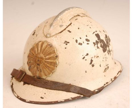 A French M26 Adrian helmet, painted with with badge to the crown, having a leather liner and chin strap, thought to have been