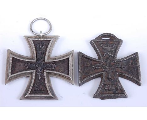 An Imperial German 1914 Iron Cross 2nd class, stamped 800 to the suspension loop, together with a home made model of an Iron 