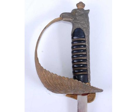 A WW II period Italian Airforce Officer's dress sword, having an 83cm blade etched with arms, crowned eagle, trophies of arms