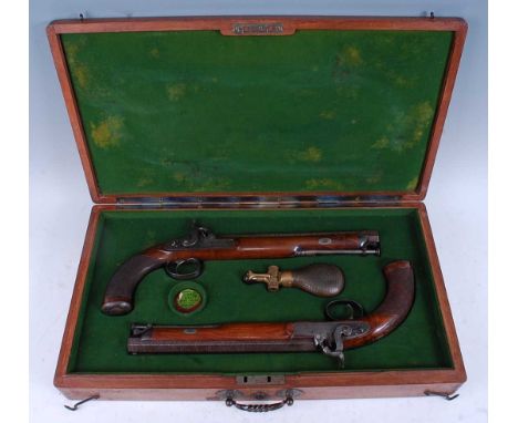 A cased pair of English percussion pistols by Westley Richards, mid 19th century, each having 25.5cm octagongal brown-twist b