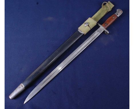 A British 1907 pattern bayonet, the 43cm single edged blade marked to the ricasso with a crowned GR cypher 1907 Wilkinson Pal