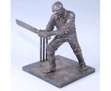 An early 20th century silver plated model of a cricketer, the batsman in striking pose on a square base by Walker &amp; Hall,