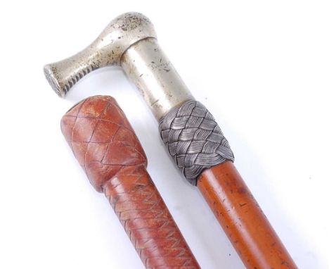 An early 20th century crop, having a malacca shaft with woven white metal collar and metal tip engraved Swaine &amp; Adney, L