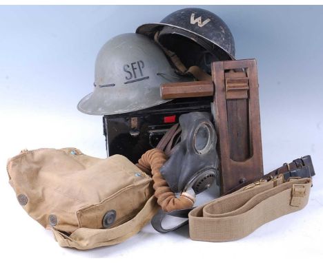 A collection of WW II Home Guard items to include an Mk II A.R.P. Wardens helmet marked F&amp;L 422 /1939 for Fisher &amp; Lu