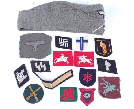 A German M34 Panzer Grenadiers Overseas side cap, together with various cloth formation signs to include Airbourne Division a