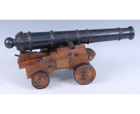 A scale made model of H.M.S. Victory's middle gun deck 24 pounder cannon, the 45cm barrel mounted in an oak carriage with iro