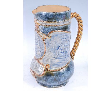 A Royal Doulton stoneware Nelson commemorative jug, circa 1905, on a mottled blue ground relief decorated with a portrait pla