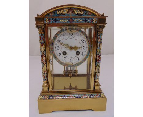 A French champlevé, brass and four glass mantle clock, white enamel dial, Arabic numerals, to include key and mercury pendulu