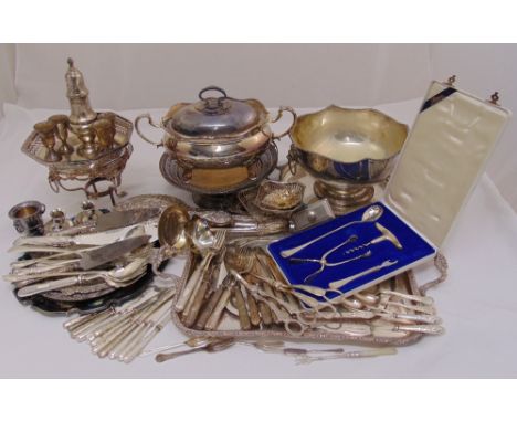 A quantity of silver plate to include trays, a punch bowl, covered dish and flatware