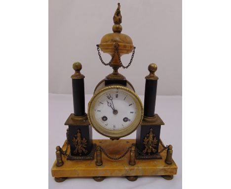 Louis XVI mantle clock, white enamel dial, Roman numerals, flanked by two columns on rectangular Sienna marble base, to inclu