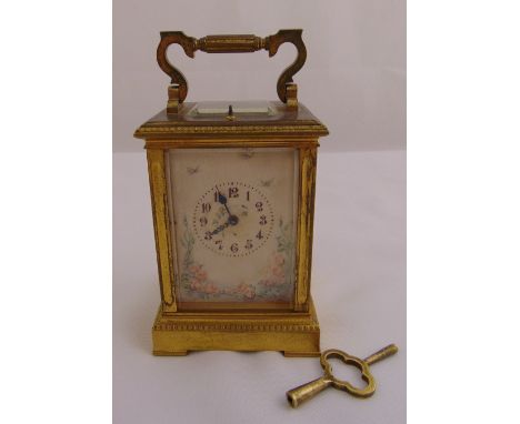 A French gilded metal repeating carriage clock with painted side panels and dial, to include key, 12 x 7.5 x 8cm