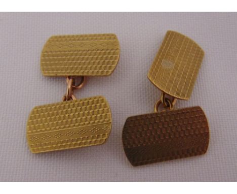 A pair of 9ct gold engine turned cufflinks, approx total weight 6.1g