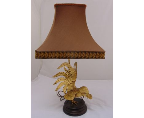 A gilded metal table lamp in the form of a cockerel on circular wooden base, to include shade, 72cm (h)