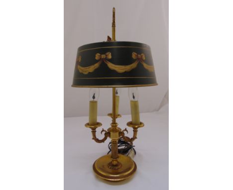 A three branch lamp stand with painted metal shade on raised circular base, 60cm (h)