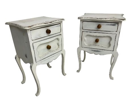 Pair of rustic French design bedside lamp tables, each fitted with two drawers, on cabriole supportsDimensions: Height:&nbsp;