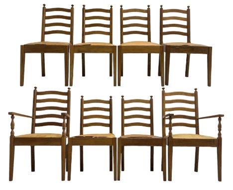 Late 20th century set of eight (6+2) oak ladder-back dining chairs, chamfered upright supports with turned finials, drop-in s