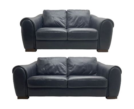 Large three-seat sofa (W212cm, H93cm, D102cm); and matching two-seat sofa (W175cm); upholstered in stitched navy blue leather