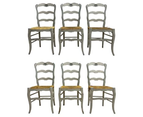 20th century set of six painted hardwood French design dining chairs, shaped ladder back, the cresting rail carved with shell