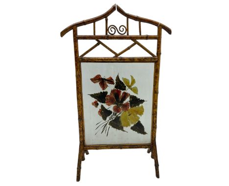 Victorian bamboo fire screen, pointed arched cresting rails over floral painted glass panel 