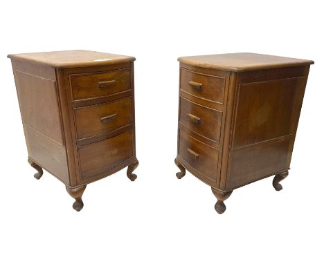 Pair of mid-20th century walnut bedside lamp chests, each fitted with three cock-beaded drawers, on cabriole feet Dimensions: