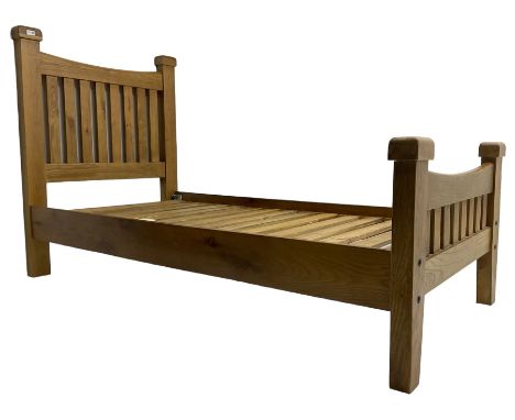 Contemporary solid light oak single bedstead, slatted headboard and footboard, raised on square supportsDimensions: Height:&n