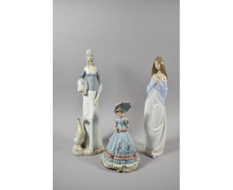 A Nao Figure of Girl, Spanish Figure of Water Carrier (AF) and a Capodimonte Lady 