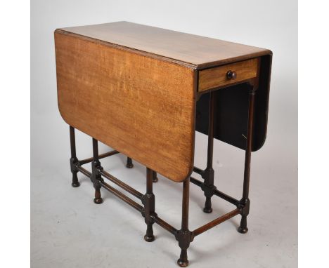 An Edwardian Mahogany Drop Leaf Gate Legged Table with Slender Turned Supports and Stretchers, 81cm Diameter 