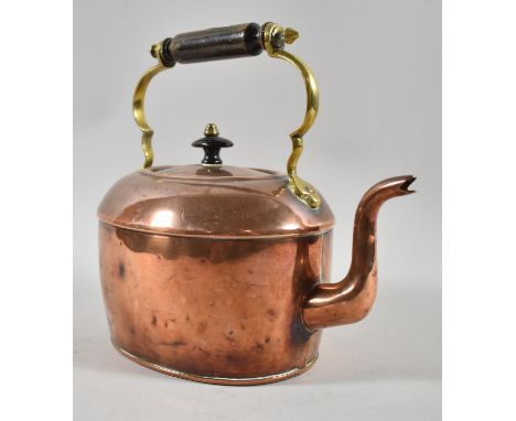 A Vintage Copper Kettle with Brass and Turned Wooden Handle, 21cm high 