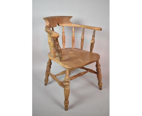 A Vintage Smoker's Bow Armchair 