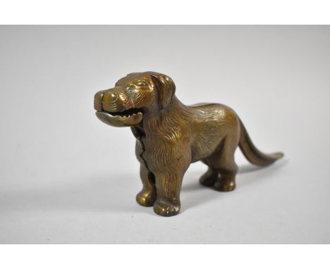 A Cast Metal Novelty Nutcracker in the Form of a Dog, 23cm Long 