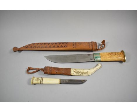 A Finnish Sami Knife Having Tooled Leather Inscribed J Marttiini, Made in Finland Together with a Bone Handled Smaller Exampl