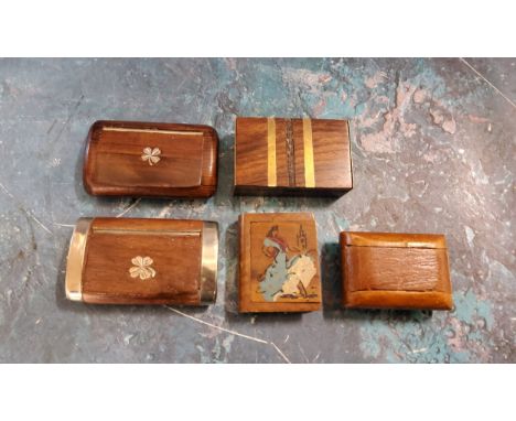 An Irish snuff box, the cover inlaid with shamrock, 7cm wide, c.1920;&nbsp; another;&nbsp; others (5) 