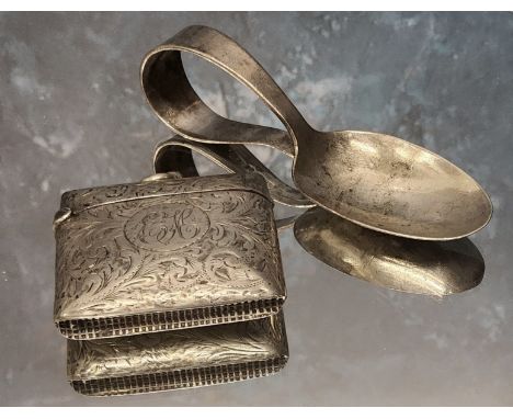 An Edwardian silver vesta case, chased and engraved with scrolls, monogrammed EH, W*?, Birmingham, 1903; a silver baby's feed