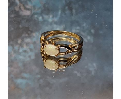 A 9ct gold ring claw set with an oval opal, size N, hallmarked, 2.52g 