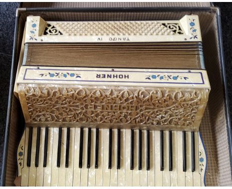 An Hohner Tango IV accordion, cased 