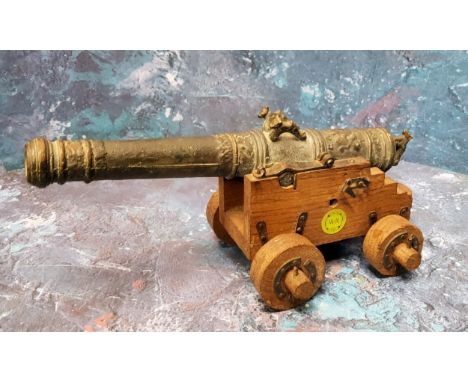 An 20th century bronze replica of Vasa Wasa Sweden 1628&nbsp; ship's cannon,&nbsp;on oak four wheel carriage, the cannon 20cm