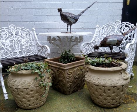 Three decorative garden planters, a pair of reconstituted stone twin handled urns and a flared square terracotta planter (3) 