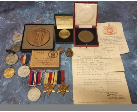A WWII Service Medal 1939-1945, a World 1939-1945 Star, an Africa Star all with ribbons, awarded posthumously to Edgar Norman