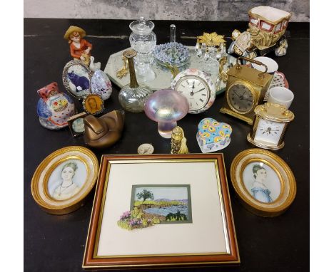 A Junghans brass carriage clock;&nbsp; a glass mushroom paperweight;&nbsp; a mirrored dressing table tray;&nbsp; print miniat
