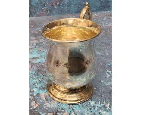 A silver Christening mug, engraved G.A. Moore 28.1.46, ES, Sheffield, 1945, 108.93g 