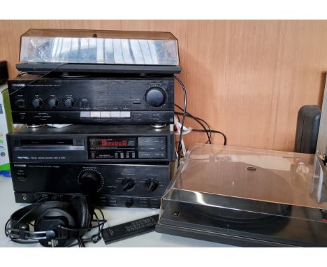 A Kenwood KA 5020 Stereo Integrated Amplifier; another, KA 1010;&nbsp; &nbsp;a Rotel Digital Stereo Compact Disc Player;&nbsp