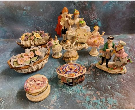 An early 20th century Continental figure group, a gentleman and lady courting, lace skirt, 14cm high;&nbsp; others;&nbsp; Lla