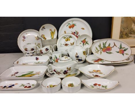 Royal Worcester Evesham and Evesham Vale- 13 bowls, 6 soup bowls and stands, side plates, teapot, cream jug, serving plates, 