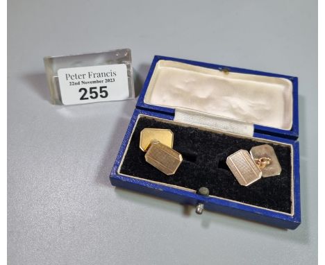 Pair of engine turned 9ct gold chain-linked cufflinks.  8.4g approx.   (B.P. 21% + VAT) 