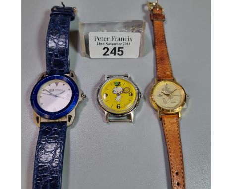 Hewlett Packard presentation wristwatch with leather strap together with a Snoopy watch playing tennis dated 1958 with no str