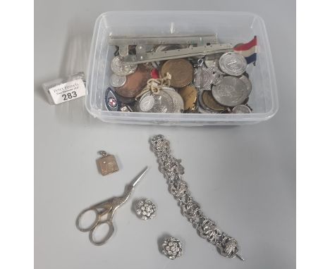 Tub of assorted items to include: Royal Life Saving Society Medal, coins, medallions, rolled gold locket, Victorian lockets, 