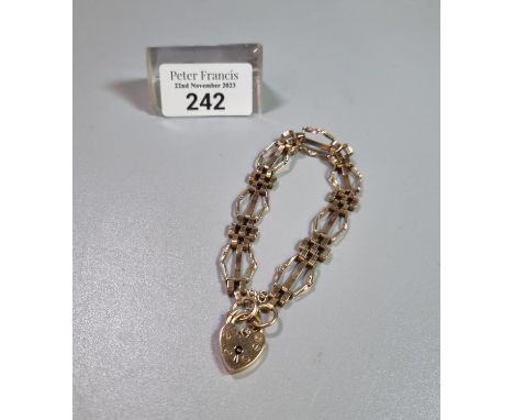 9ct gold three bare gate bracelet with heart padlock.  8.8g approx.  (B.P. 21% + VAT) 